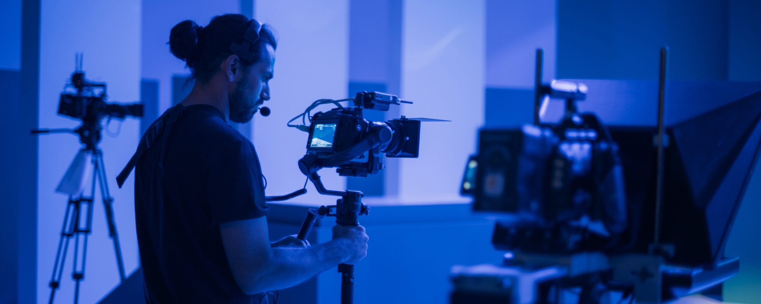 Director,Of,Photography,With,A,Camera,In,His,Hands,On